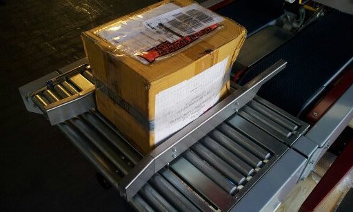 1346430928405.jpg Rulliera in ingresso con guide laterali autocentranti